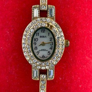 Bora Women Wristwatch Gold Tone Crystal accent Bezel and Band Quartz Watch